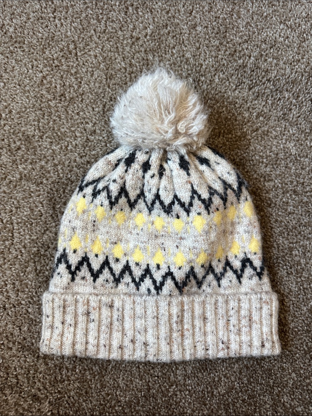 Women’s Pom Pom Knit Beanie - Cream with Yellow & Black Pattern.